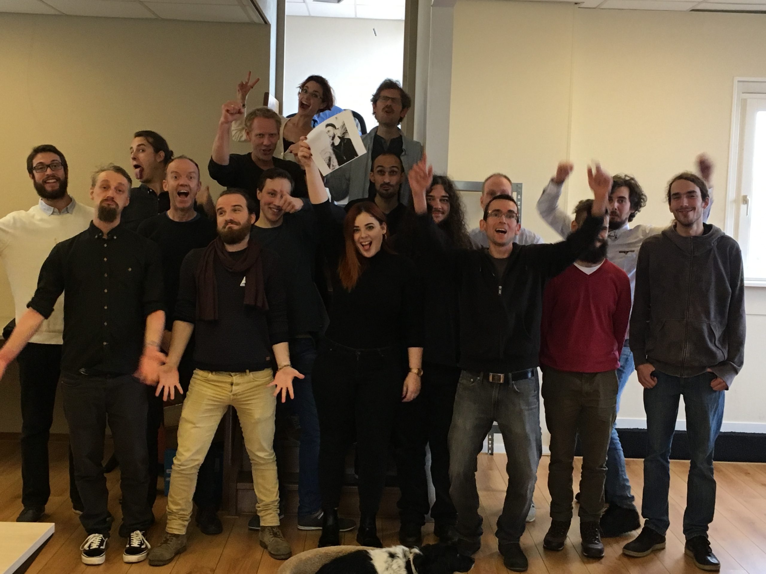 a group of people standing next to each other.