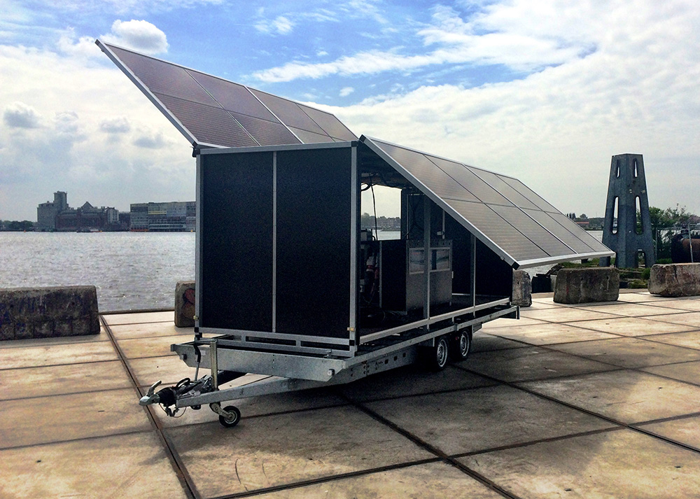 a trailer with a solar panel on top of it.