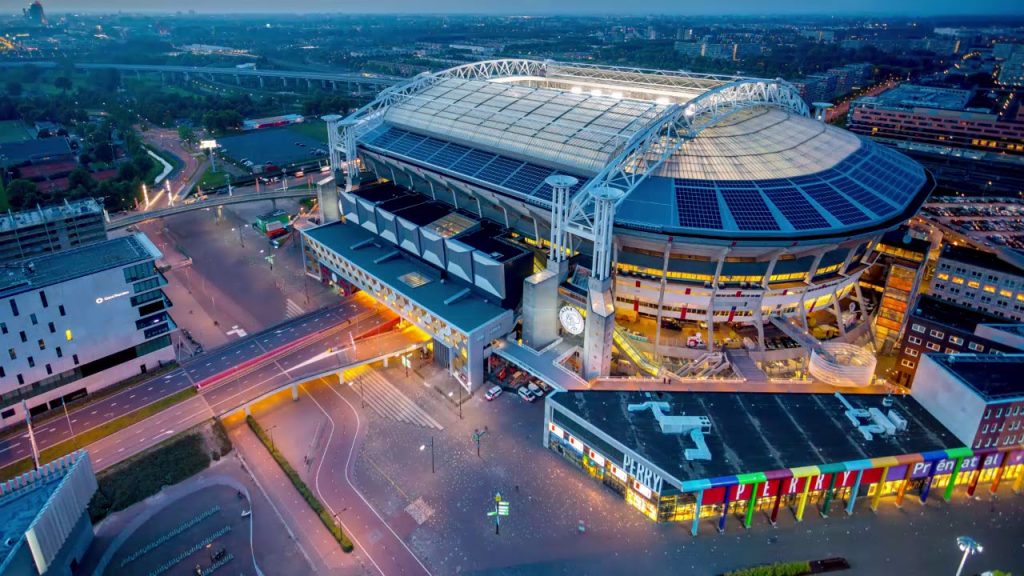 an aerial view of a stadium at night.
