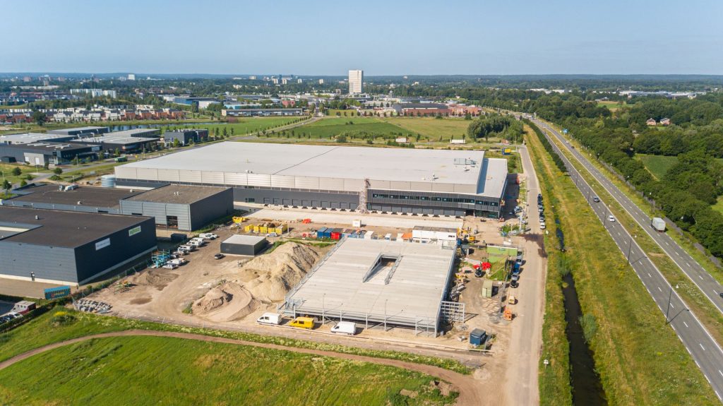 an aerial view of a factory building under construction.